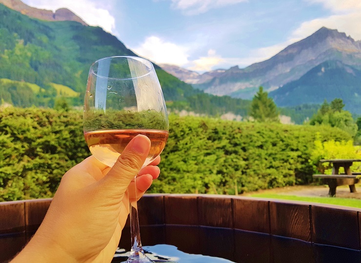 Enjoying a glass of wine in the private jacuzzi