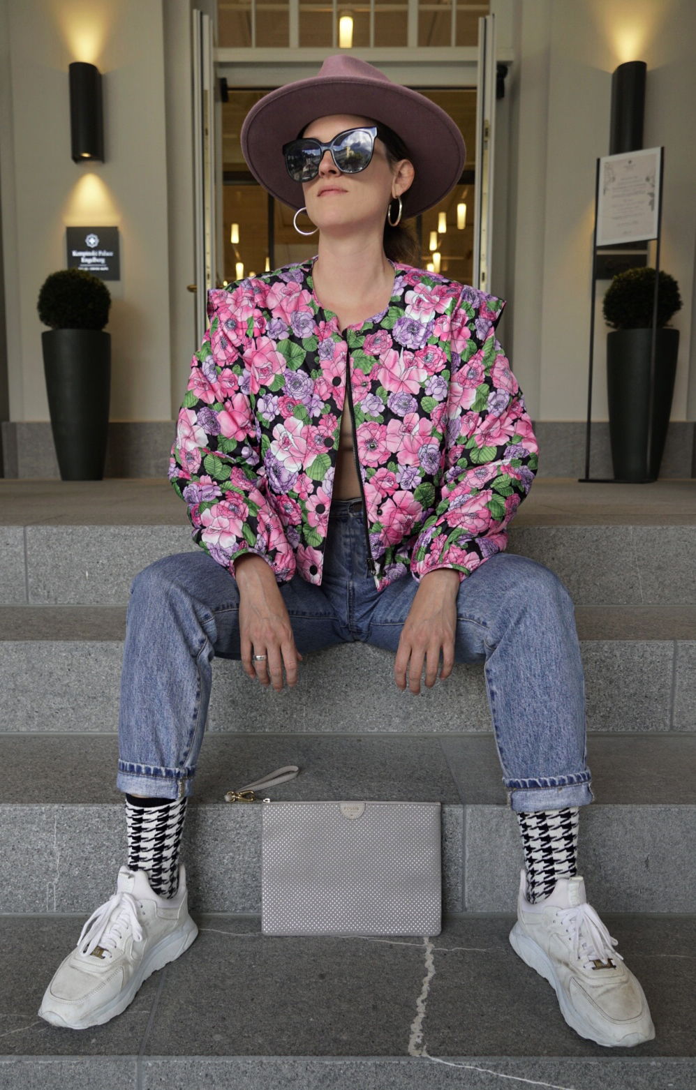 Andrea Steiner from sustainable fashion blog Strawberries 'n' Champagne based in Switzerland, wears a colorful vintage look jacket by the danish brand Cras.