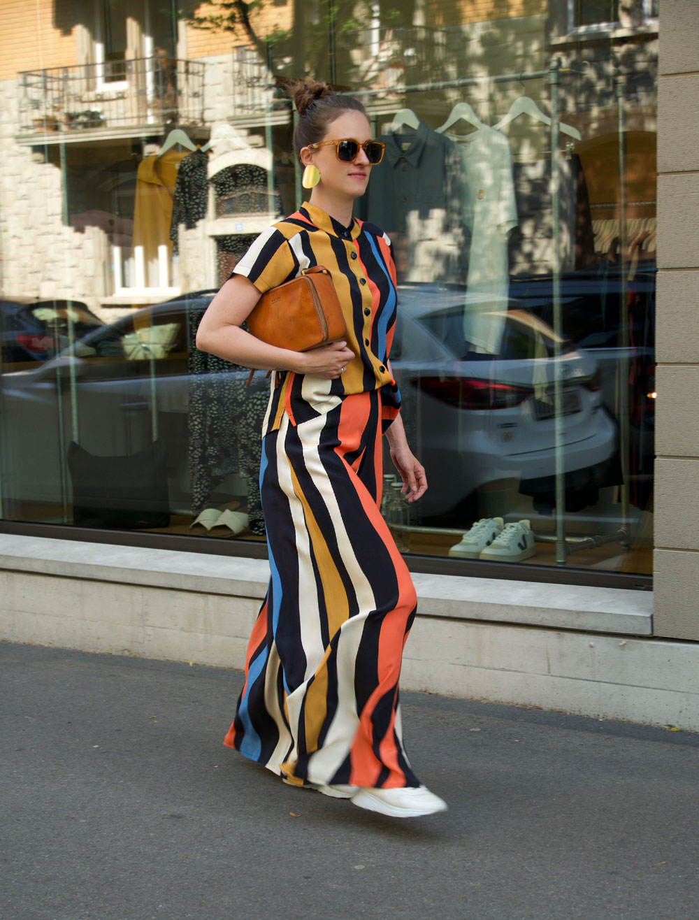 Andrea Steiner from the sustainable fashion blog Strawberries 'n' Champagne based in Switzerland wears an outfit by Komana, shoes by Ekin, a bag by O My Bag and jewelry by fremdformat.