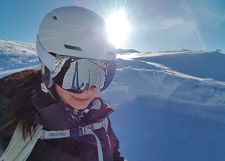 Checking the reflection in Mel B's goggles on a sunny ski slope Davos Ski Resort switzerland 